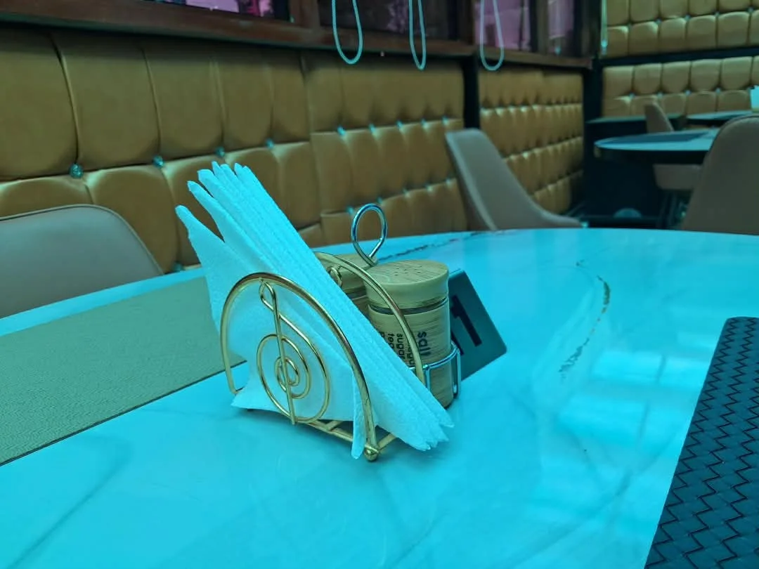 A set table with napkins in the restaurant