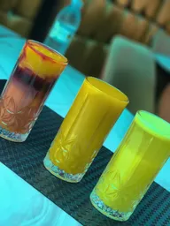 Fresh juices in tall glasses